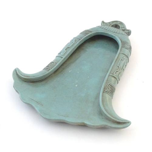 47 - A Chinese incense holder / dish of stylised bell form with relief temple bell style decoration. Appr... 