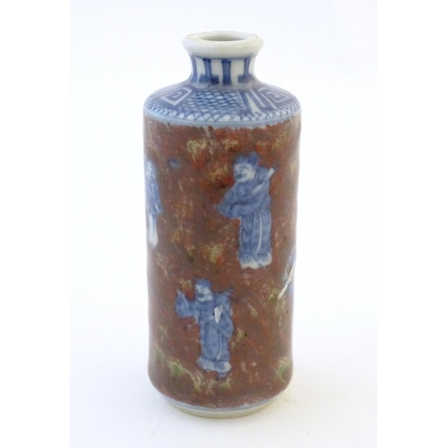 51 - A Chinese snuff bottle with blue and white figures and a mottled ground. Character marks under. Appr... 