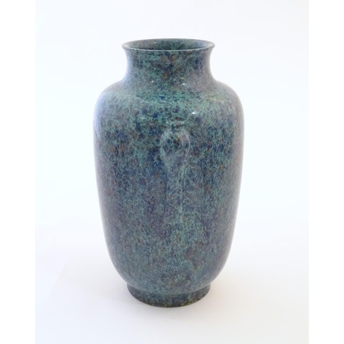 56 - A Chinese vase with moulded twin handles and speckled detail. Impressed character marks under. Appro... 