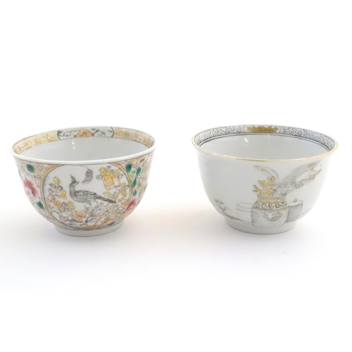 39 - Two Chinese tea bowls / cups, one with grisaille decoration depicting a female figure, a stylised do... 