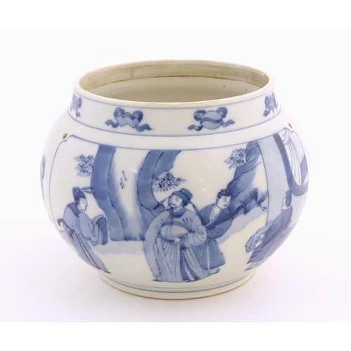 35 - A Chinese blue and white planter with four drilled hanging holes, decorated with panelled decoration... 