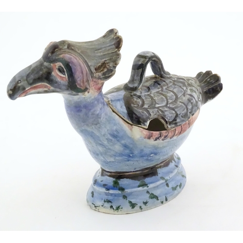 168A - A Continental pot and cover modelled as a stylised bird. Approx. 6 1/4