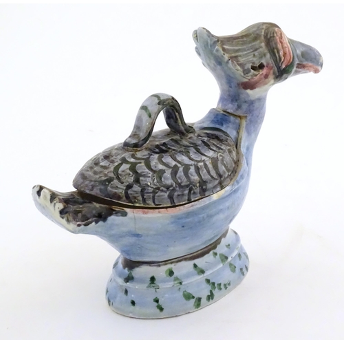 168A - A Continental pot and cover modelled as a stylised bird. Approx. 6 1/4