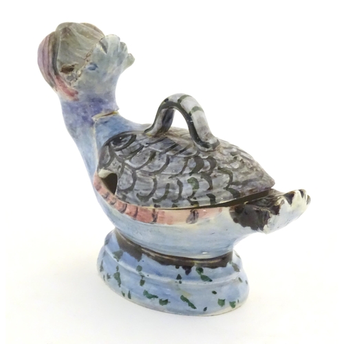 168A - A Continental pot and cover modelled as a stylised bird. Approx. 6 1/4