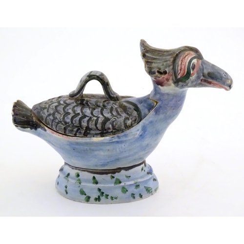 168A - A Continental pot and cover modelled as a stylised bird. Approx. 6 1/4