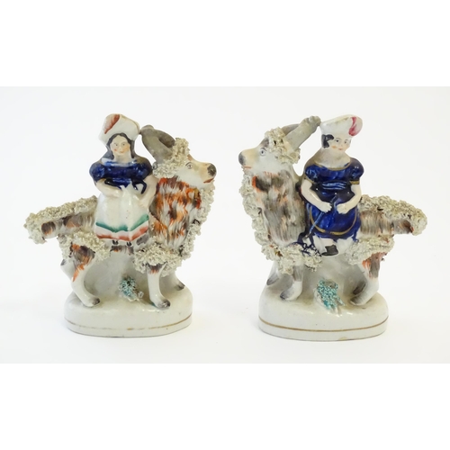 106 - A pair of Victorian Staffordshire pottery figures depicting the Princess Royal, and the Prince of Wa... 