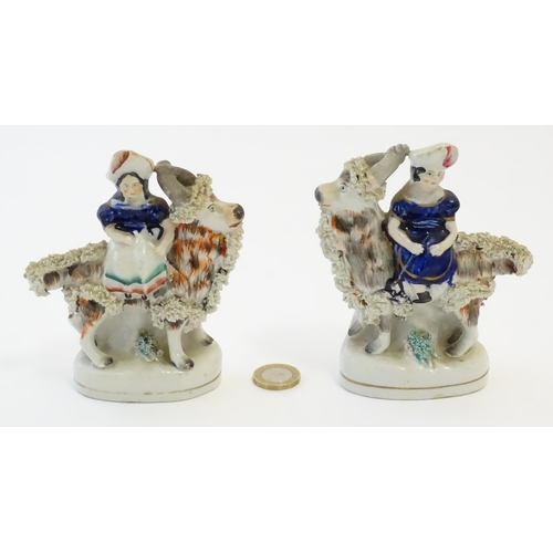 106 - A pair of Victorian Staffordshire pottery figures depicting the Princess Royal, and the Prince of Wa... 