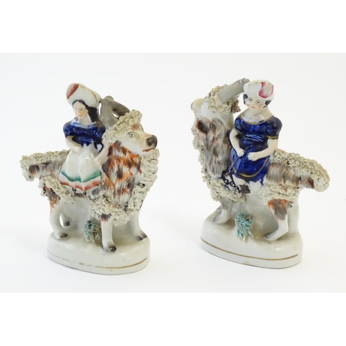 106 - A pair of Victorian Staffordshire pottery figures depicting the Princess Royal, and the Prince of Wa... 