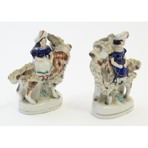 106 - A pair of Victorian Staffordshire pottery figures depicting the Princess Royal, and the Prince of Wa... 