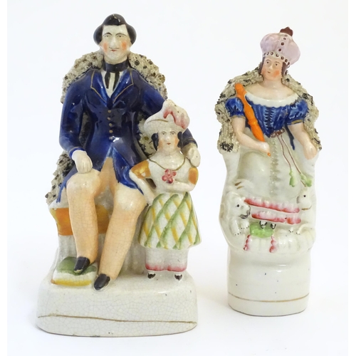 113 - A Victorian Staffordshire pottery figural group depicting Albert seated with the Prince of Wales, to... 