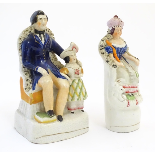 113 - A Victorian Staffordshire pottery figural group depicting Albert seated with the Prince of Wales, to... 