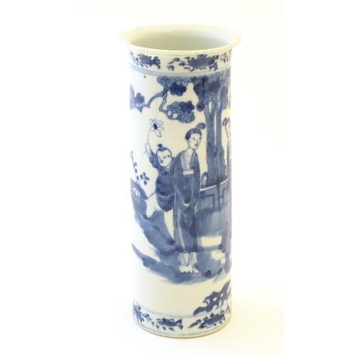 70 - A Chinese blue and white vase of cylindrical form decorated with figures in a garden landscape with ... 