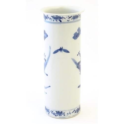 70 - A Chinese blue and white vase of cylindrical form decorated with figures in a garden landscape with ... 