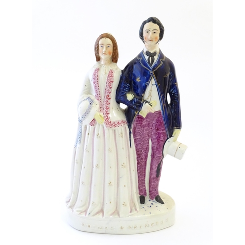 89 - A large Victorian Staffordshire pottery flat back figural group depicting the Prince and Princess. A... 