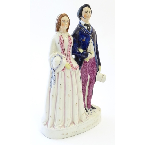 89 - A large Victorian Staffordshire pottery flat back figural group depicting the Prince and Princess. A... 