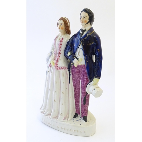 89 - A large Victorian Staffordshire pottery flat back figural group depicting the Prince and Princess. A... 