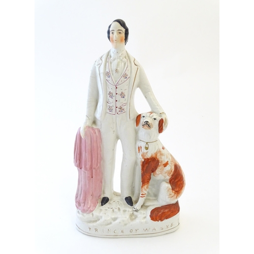 91 - A large Victorian Staffordshire pottery flat back figure depicting the Prince of Wales with a Spanie... 