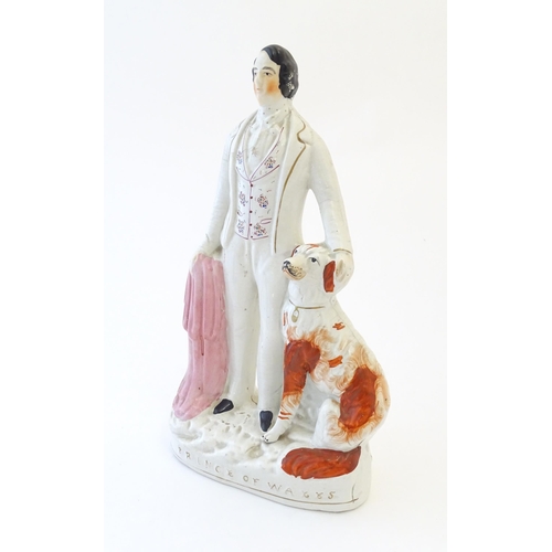 91 - A large Victorian Staffordshire pottery flat back figure depicting the Prince of Wales with a Spanie... 