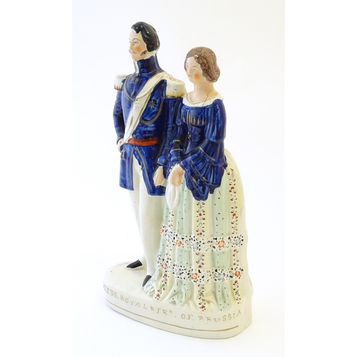 93 - A large Victorian Staffordshire pottery flat back figural group depicting the Princess Royal and Frk... 