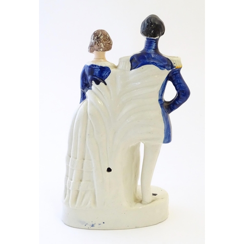 93 - A large Victorian Staffordshire pottery flat back figural group depicting the Princess Royal and Frk... 