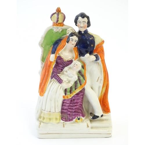 96 - A Victorian Staffordshire pottery flat back figural group depicting The Royal Family, with Queen Vic... 