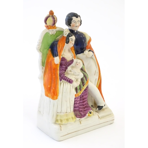 96 - A Victorian Staffordshire pottery flat back figural group depicting The Royal Family, with Queen Vic... 