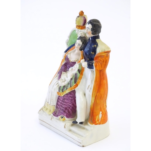 96 - A Victorian Staffordshire pottery flat back figural group depicting The Royal Family, with Queen Vic... 