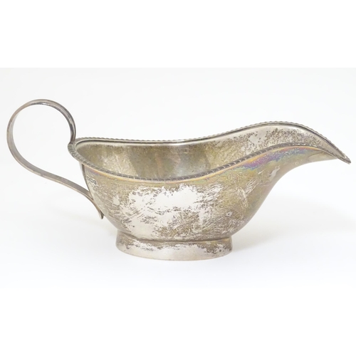 413 - A silver sauceboat, hallmarked Sheffield 1918 maker Lee & Wigfull. Approx 8