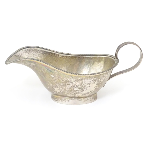 413 - A silver sauceboat, hallmarked Sheffield 1918 maker Lee & Wigfull. Approx 8
