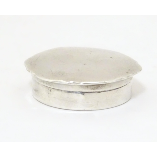 414 - A silver pill box, hallmarked Birmingham 1925 maker Mappin & Webb Ltd. 1 1/2