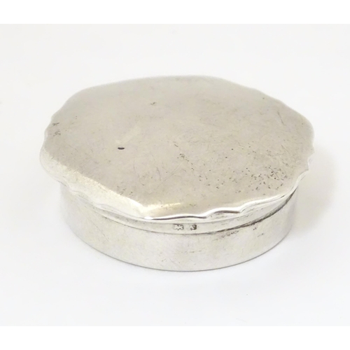 414 - A silver pill box, hallmarked Birmingham 1925 maker Mappin & Webb Ltd. 1 1/2