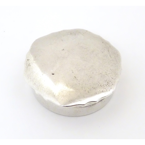 414 - A silver pill box, hallmarked Birmingham 1925 maker Mappin & Webb Ltd. 1 1/2