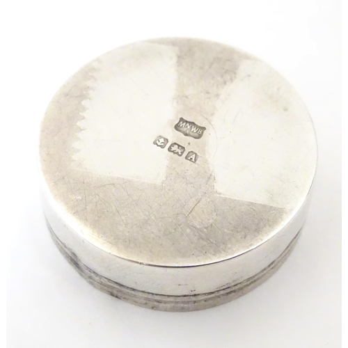 414 - A silver pill box, hallmarked Birmingham 1925 maker Mappin & Webb Ltd. 1 1/2