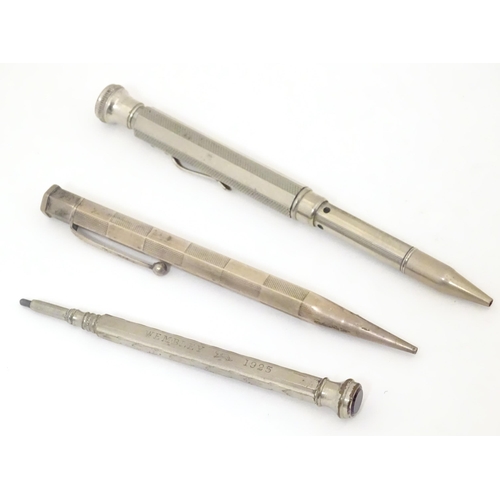 417 - 3 Propelling pencils : A Sterling silver pencil with engine turned decoration by Yard O Led, patent ... 