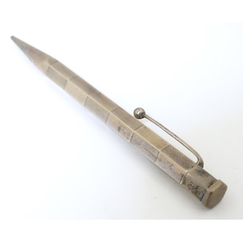 417 - 3 Propelling pencils : A Sterling silver pencil with engine turned decoration by Yard O Led, patent ... 