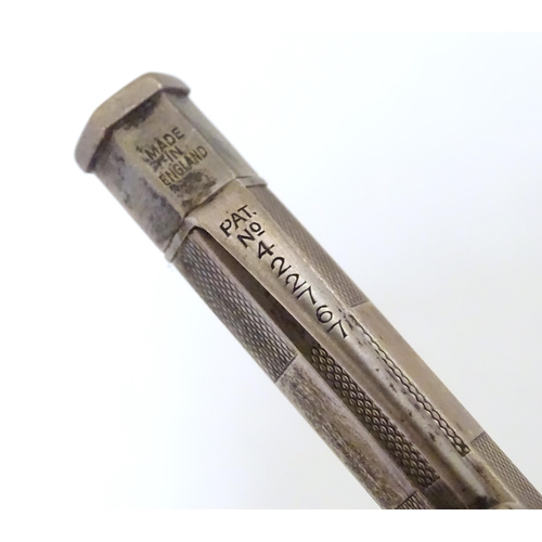 417 - 3 Propelling pencils : A Sterling silver pencil with engine turned decoration by Yard O Led, patent ... 
