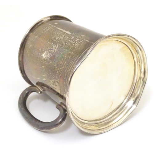 430 - A silver Christening mug hallmarked Birmingham 1936. 3