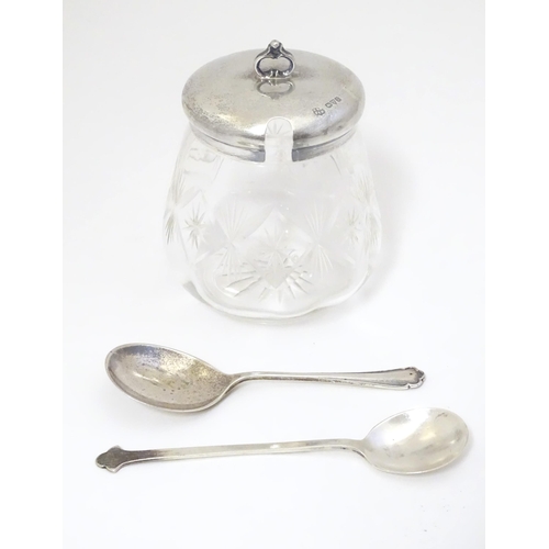 448 - A cut glass jam / preserve pot with silver top hallmarked Chester 1925 maker Barker Brothers togethe... 