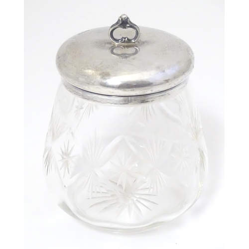 448 - A cut glass jam / preserve pot with silver top hallmarked Chester 1925 maker Barker Brothers togethe... 