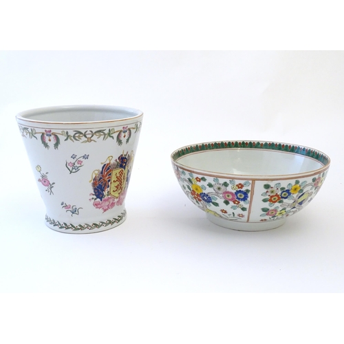 83 - A Chinese bowl decorated with birds and flowers. Together with a Chinese planter / jardiniere of tap... 