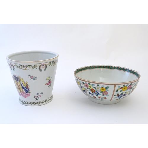 83 - A Chinese bowl decorated with birds and flowers. Together with a Chinese planter / jardiniere of tap... 