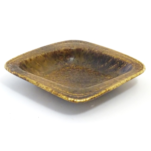 148A - A mid century Swedish studio pottery dish by Gunner Nyland for Rorstrand, Sweden. Approx. 7 3/4