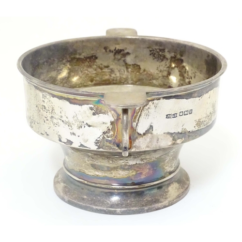 439 - A silver porringer with twin handles hallmarked Sheffield 1913 maker James Dixon & Sons Ltd. 6 1/2