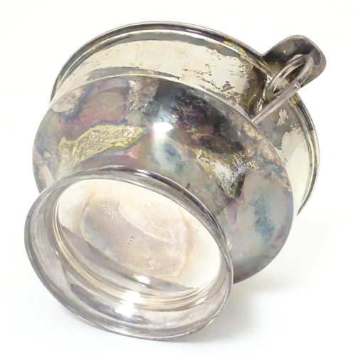 439 - A silver porringer with twin handles hallmarked Sheffield 1913 maker James Dixon & Sons Ltd. 6 1/2