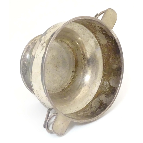 439 - A silver porringer with twin handles hallmarked Sheffield 1913 maker James Dixon & Sons Ltd. 6 1/2