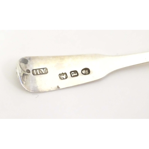 440 - A pair of Geo III silver fiddle pattern salt spoons Hallmarked London 1810 maker AH. 
Together with ... 