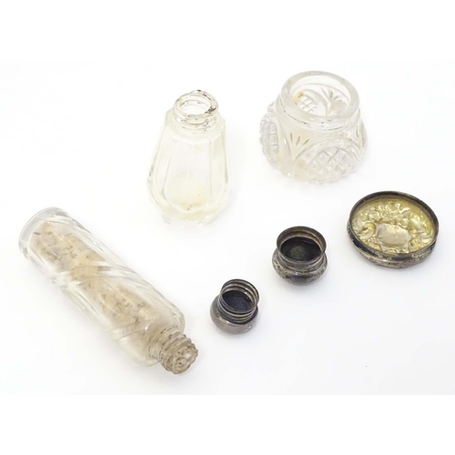 584 - Two small silver lidded glass scent / perfume bottles hallmarked London 1904 makers Henry Perkins & ... 