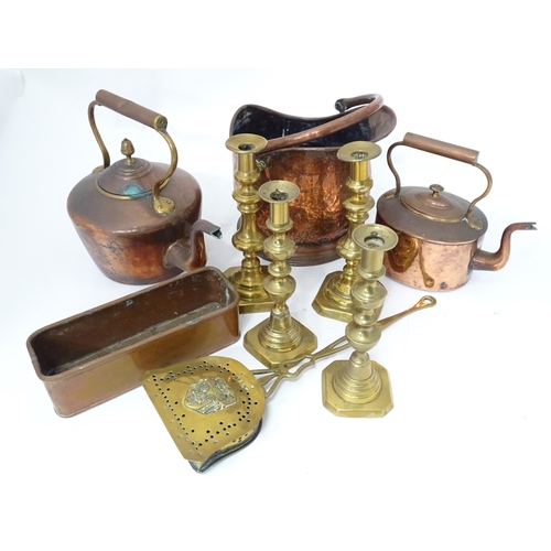 18 - A quantity of brass and copper wares to include coal scuttle, kettles, copper pot, candlesticks, etc... 