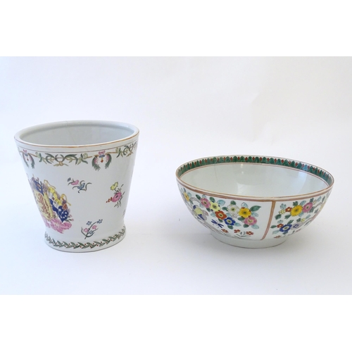 60 - A Chinese bowl decorated with birds and flowers. Together with a Chinese planter / jardiniere of tap... 