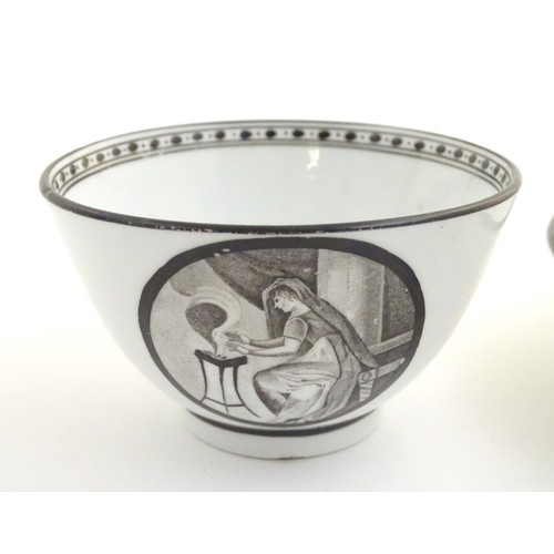 72 - A 19thC tea bowl and saucer, decorated with monochrome roundels depicting a seated man warming by a ... 